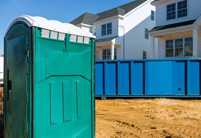 clean porta potties set up for worker convenience